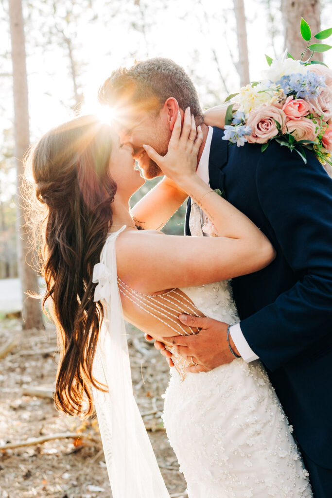 Couple embracing at Blue Bridge venue in Michigan